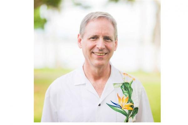 Rev. Michael Officiant