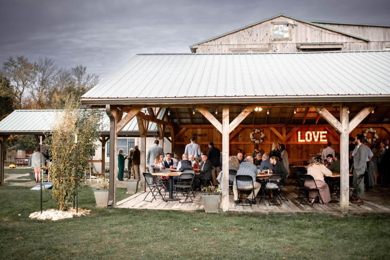 ​Our Amish-built cocktail pavilion is a truly unique space, designed to provide a warm and inviting atmosphere for your big day.  With a custom-built bar, a farm table for appetizers, and chic guest tables, our pavilion is the perfect spot for sipping on 