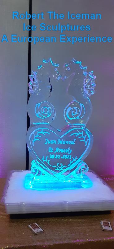 Heart with names and great and seahorses on top kissing